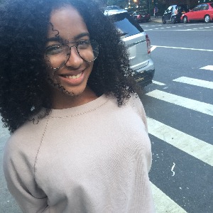 Girl smiling on a street
