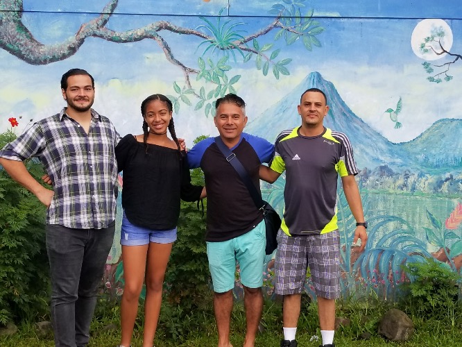 Friends in front of painting in Costa Rica
