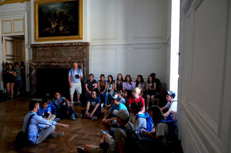 students at the Palace of Versailles