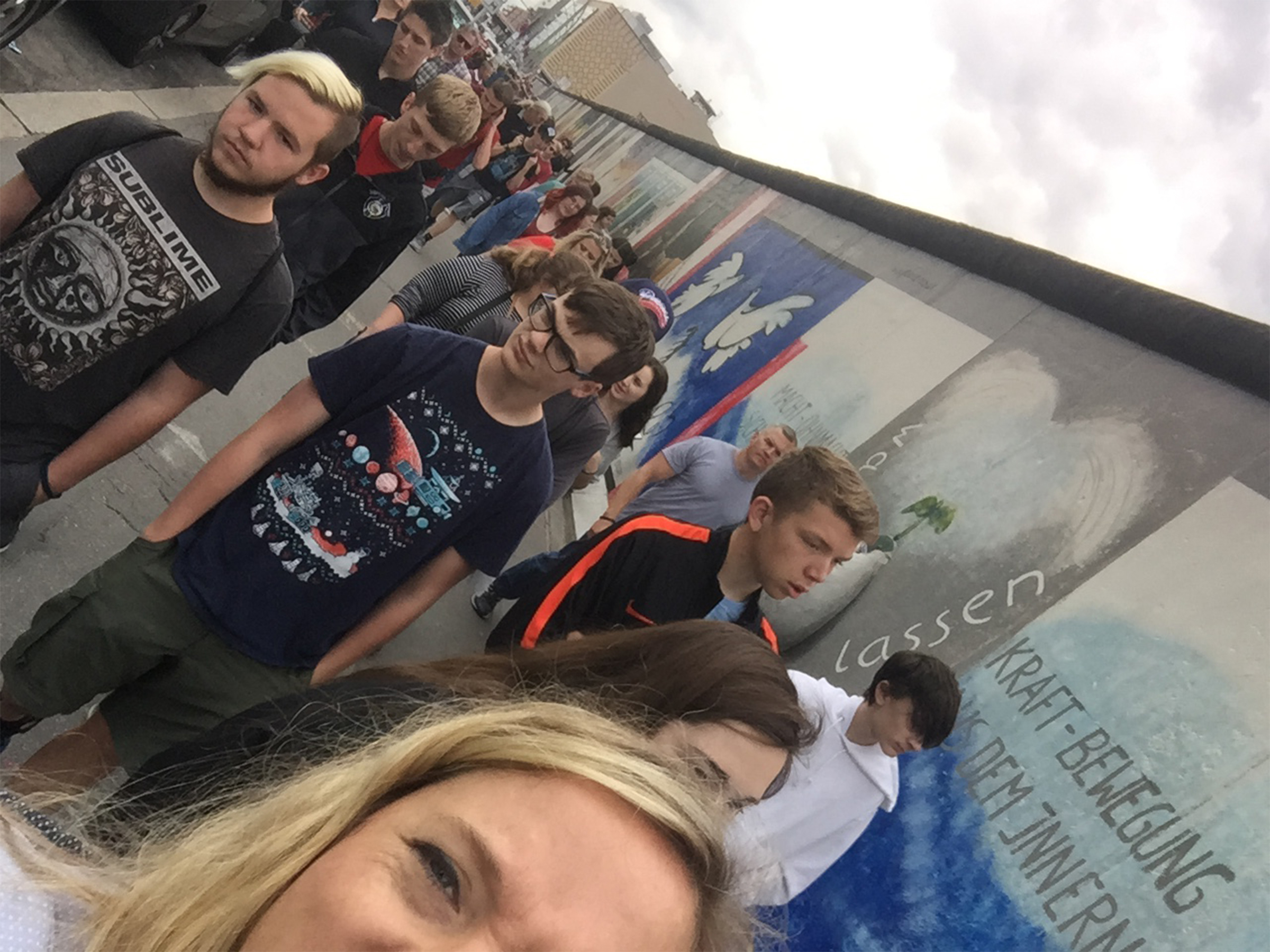Heather shows her students the Berlin Wall as a prelude to their student reflection activities.