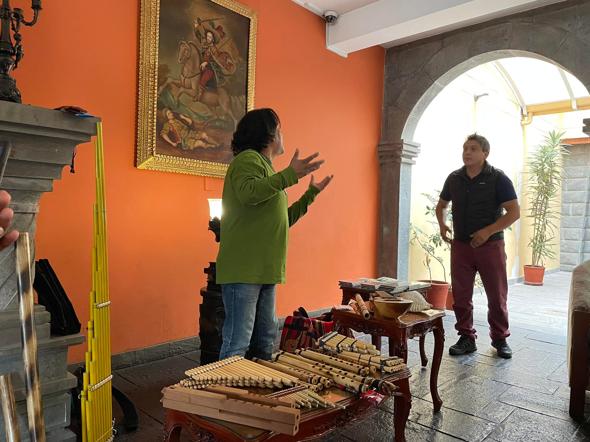 Pictures of Peru 4/4: Image of a musician in front of a table of musical instruments